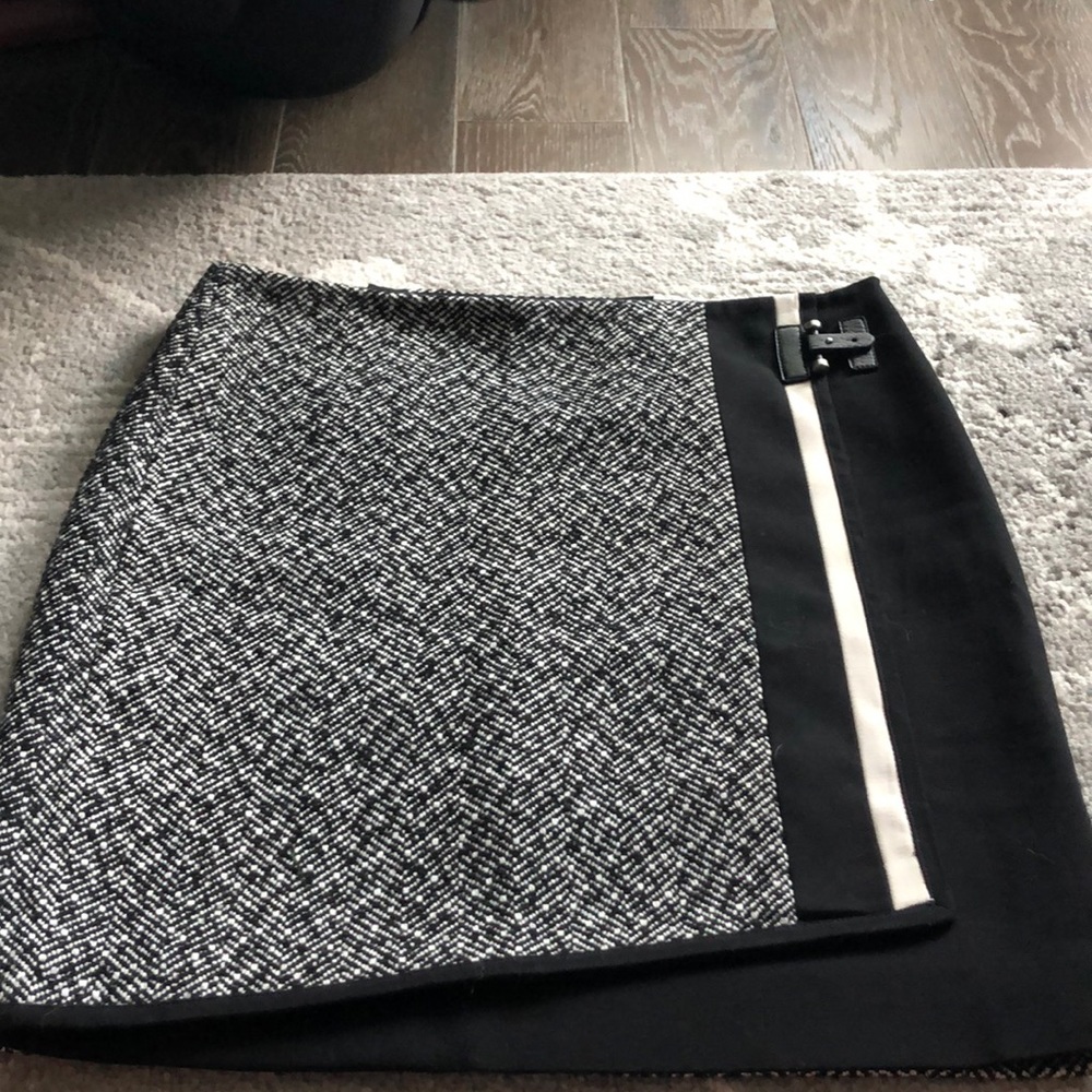 Tweed lined skirt.  True to size